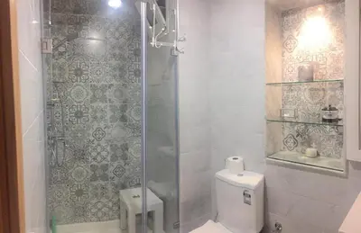 a bathroom with a shower and a toilet at Aryam Room in Rabat