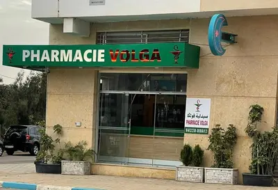 a store with a sign on the front of a building at Échappez à la ville , Appartement près de la nature, entre forêt et plage juste pour les familles in Skhirat