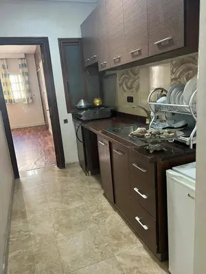 a kitchen with a sink and a counter top at 2mars in Casablanca