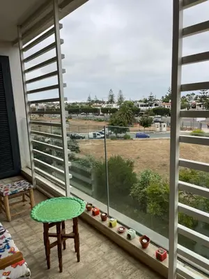 a room with a window with a view of a field at Luxury Flat in Casa Finance City in Casablanca