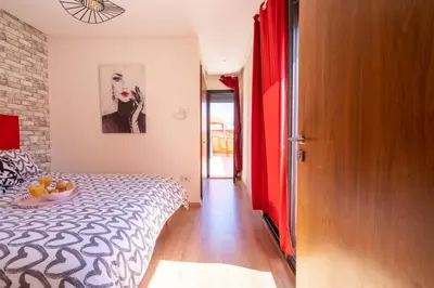a bedroom with a bed with a bowl of fruit on it at Terrasses de Marrakech- Au coeur de Casablanca in Casablanca