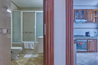 a bathroom with a toilet and a sink at YourPlace Rabat Agdal 1 - Cozy Residence in Rabat