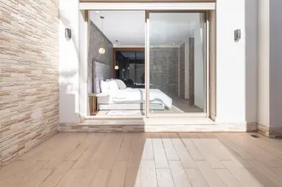 a room with a bed and a large mirror at Fresh maarif flat in new building in Casablanca
