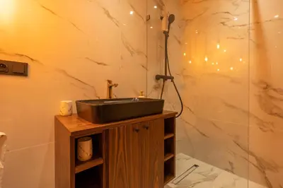 a bathroom with a sink and a shower at Fresh maarif flat in new building in Casablanca