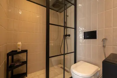 a bathroom with a shower and a toilet at c4 .super appartement with parking in Casablanca