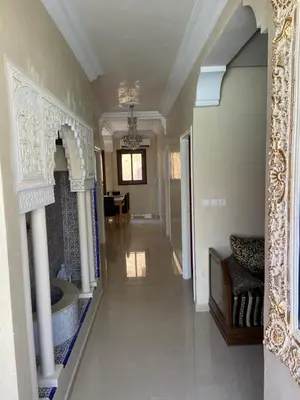 a hallway of a home with a room with a hallway at Apparemment à mohammadia in Mohammedia
