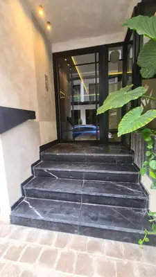 a set of stairs in front of a building at Superbe studio avec une belle terrasse à Gauthier in Casablanca