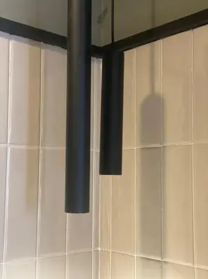 a kitchen with black pipes on the wall at Upscale flat with Gym in Casablanca