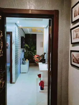 an open door to a room with a hallway at Appartement sidi rahal in Berrechid