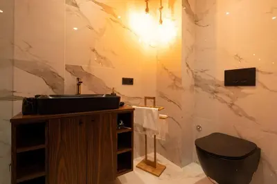 a bathroom with a sink and a toilet at Luxury one bedroom in Maarif one in Casablanca