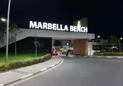 a marbella beach sign on the side of a building at Mohammédia Marbella beach appartement familliale in Mansouria
