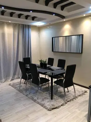 a conference room with a black table and chairs at Nice Apartment For Families- Bd Ghandi- Casablanca in Casablanca
