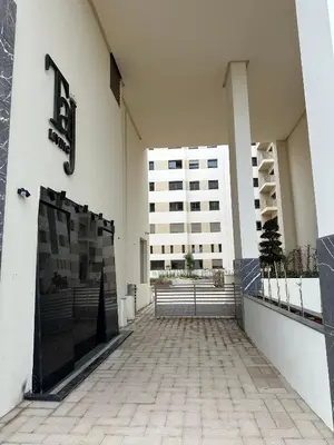 a building with a number on the side of it at TAJ NOUACEUR AéROPORT MOHAMMED V in Nouaceur