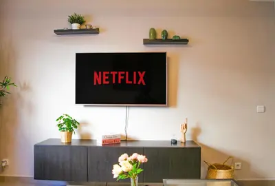 a television on a wall with the netflix sign on it at YourPlace - 2BR - Agdal - Av France in Rabat