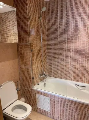 a bathroom with a toilet and a bath tub at Big luxury apartment near airport in Nouaceur