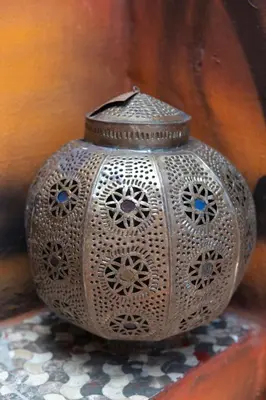 a silver vase sitting on top of a table at Booking and hosting medina in Casablanca