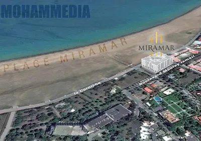 an aerial view of a airport and the ocean at Miramare Cosy appartement pied dans l'eau avec piscine in Mohammedia