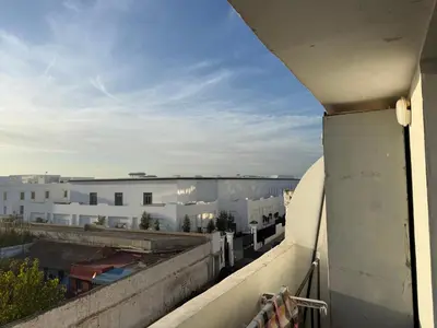 a view from the balcony of a building at Appt 1 ch salon for saison in Rabat