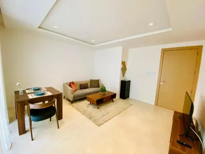 a living room with a couch and a table at La casa in Casablanca