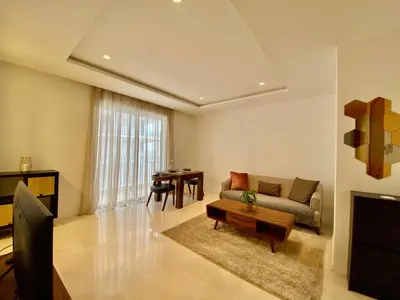 a living room with a couch and a table at La casa in Casablanca
