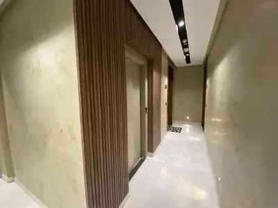 a hallway of an office building with a long corridor at NEW modern 1 BR, 1min fr tramway in Casablanca