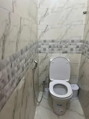 a bathroom with a toilet and a shower at Cozy place in the heart of rabat in Rabat