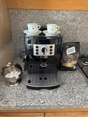 a coffee maker with two cups on top of it at Coup de cœur a 5mn de l aéroport in Nouaceur
