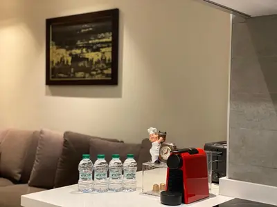 a table with several bottles of water on it at Faubourgs Anfa Top Floor By AppartAli in Casablanca