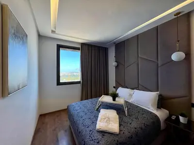 a bedroom with a bed and a window at Anfa 212 Top Floor - 2 Bedrooms- By AppartAli in Casablanca