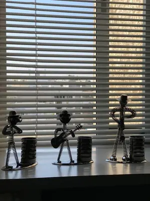 a group of skeletons sitting on a window sill at Maarif Top Floor - 2 Bedrooms - By AppartAli in Casablanca