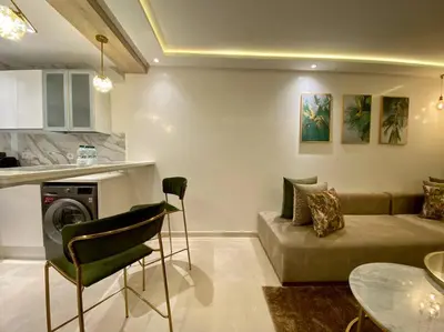 a living room with a couch and a table at Deluxe Princesses Design - By AppartAli in Casablanca