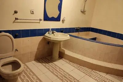 a bathroom with a toilet and a sink at Escape! Ultimate Getaway for Friends in Casablanca