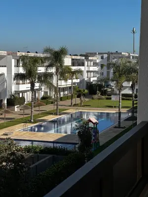 a view of a swimming pool from a building at Studio minimaliste marbella beach in Mansouria