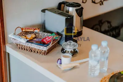 a counter with a coffee maker and a basket on it at Royal Ocean Suite - By Ayla Stay in Casablanca