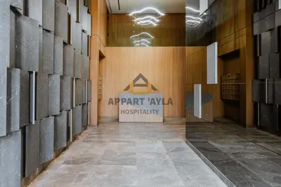 an empty hallway with a sign in a building at Royal Ocean Suite - By Ayla Stay in Casablanca