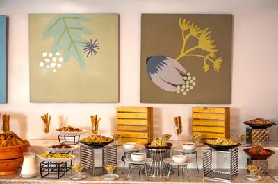 a table filled with bowls and plates of food at Kenzi Basma in Casablanca