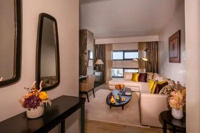 a living room with a couch and a table at Barceló Casablanca in Casablanca