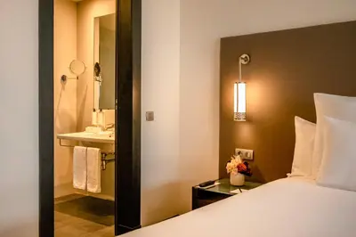 a hotel room with a bed and a sink at Barceló Casablanca in Casablanca