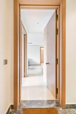 a hallway with an open door to a room at Lovely Appartement Prestigia Hayriad in Rabat