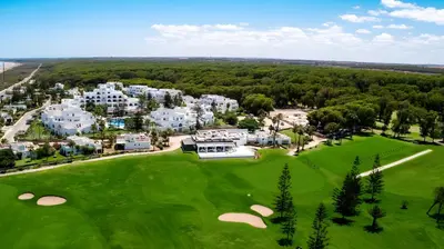 an aerial view of the golf course at a resort at Pullman Mazagan Royal Golf & Spa in El Jadida