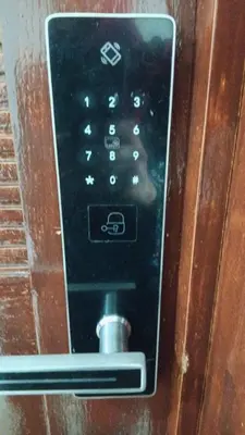 a close up of a remote control on a door at Amazing view overlooking the ocean and Hassan 2 in Casablanca