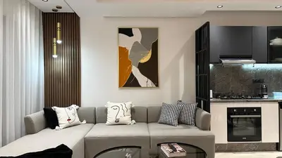 a living room with a couch and a fireplace at Charming and Central 2 Bedrooms - By AppartAli in Casablanca