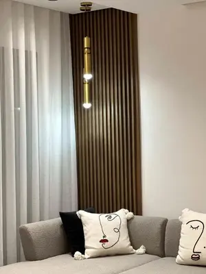 a living room with a couch and a chandelier at Charming and Central 2 Bedrooms - By AppartAli in Casablanca