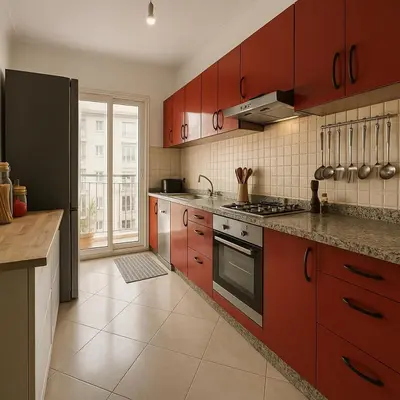 a kitchen with red cabinets and a large window at Architects Haven in Luxury 3BR - Near Train & Tramway in Casablanca
