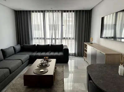 a living room with a couch and a coffee table at Casa by Casablanca in Casablanca