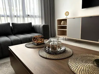 a living room with a couch and a coffee table at Casa by Casablanca in Casablanca
