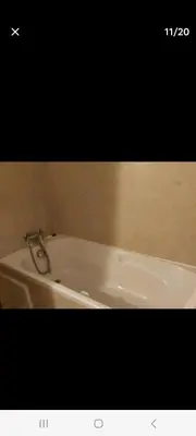 a picture of a bath tub in a bathroom at Appartement avec piscine proche de la plage in Mohammedia