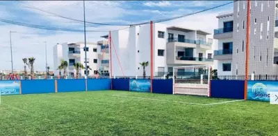 a soccer field in front of a building at BLANCA BEACH Sidi Rahal Front Mer in Sidi Rahal